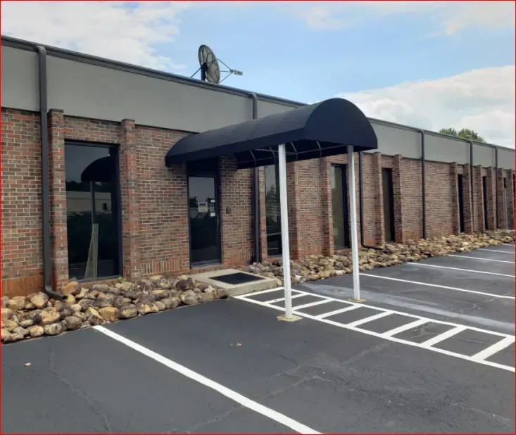 Black Half Barrel Awning — Decatur, AL — Evans Awnings