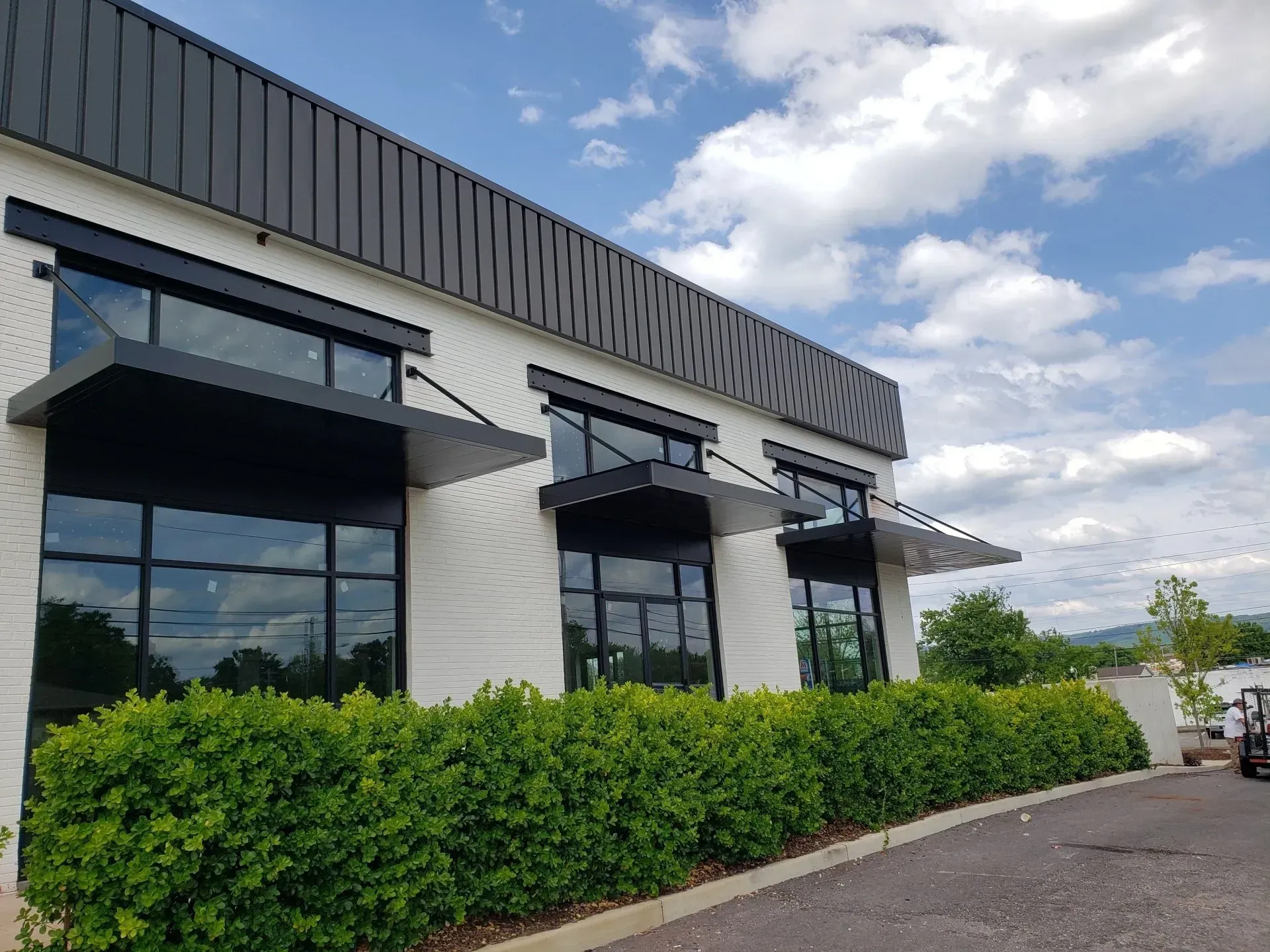 Three Black Overhead Rod Cavopy — Decatur, AL — Evans Awnings
