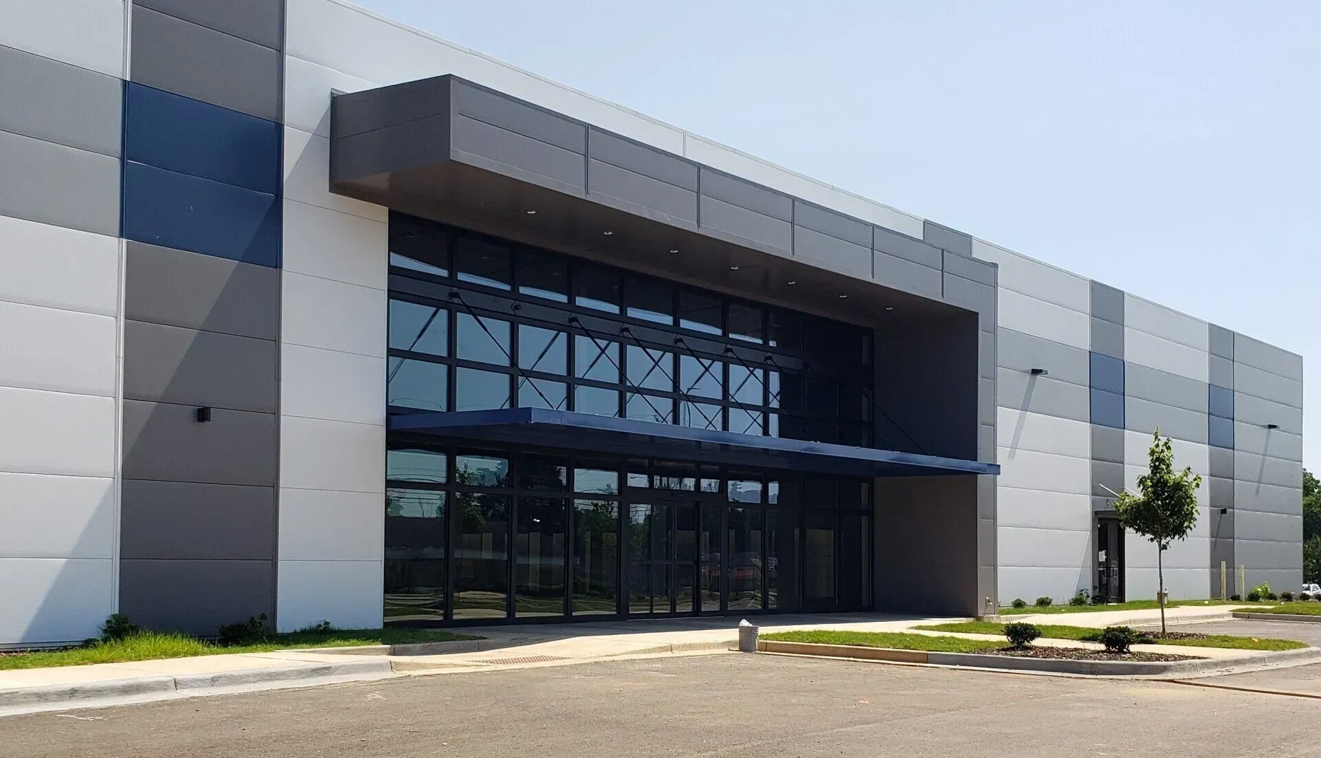 Commercial Building with Large Overhead Rod Canopy — Decatur, AL — Evans Awnings