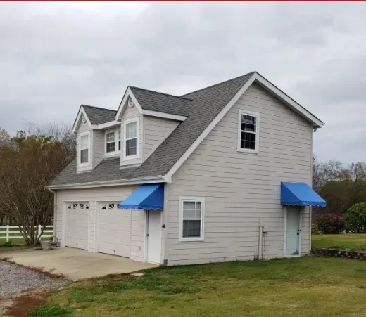 House with Two Blue Slope — Decatur, AL — Evans Awnings