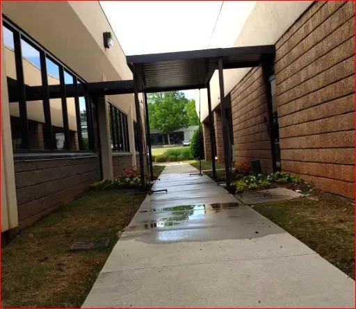 Brown Metal Walkway Canopy — Decatur, AL — Evans Awnings