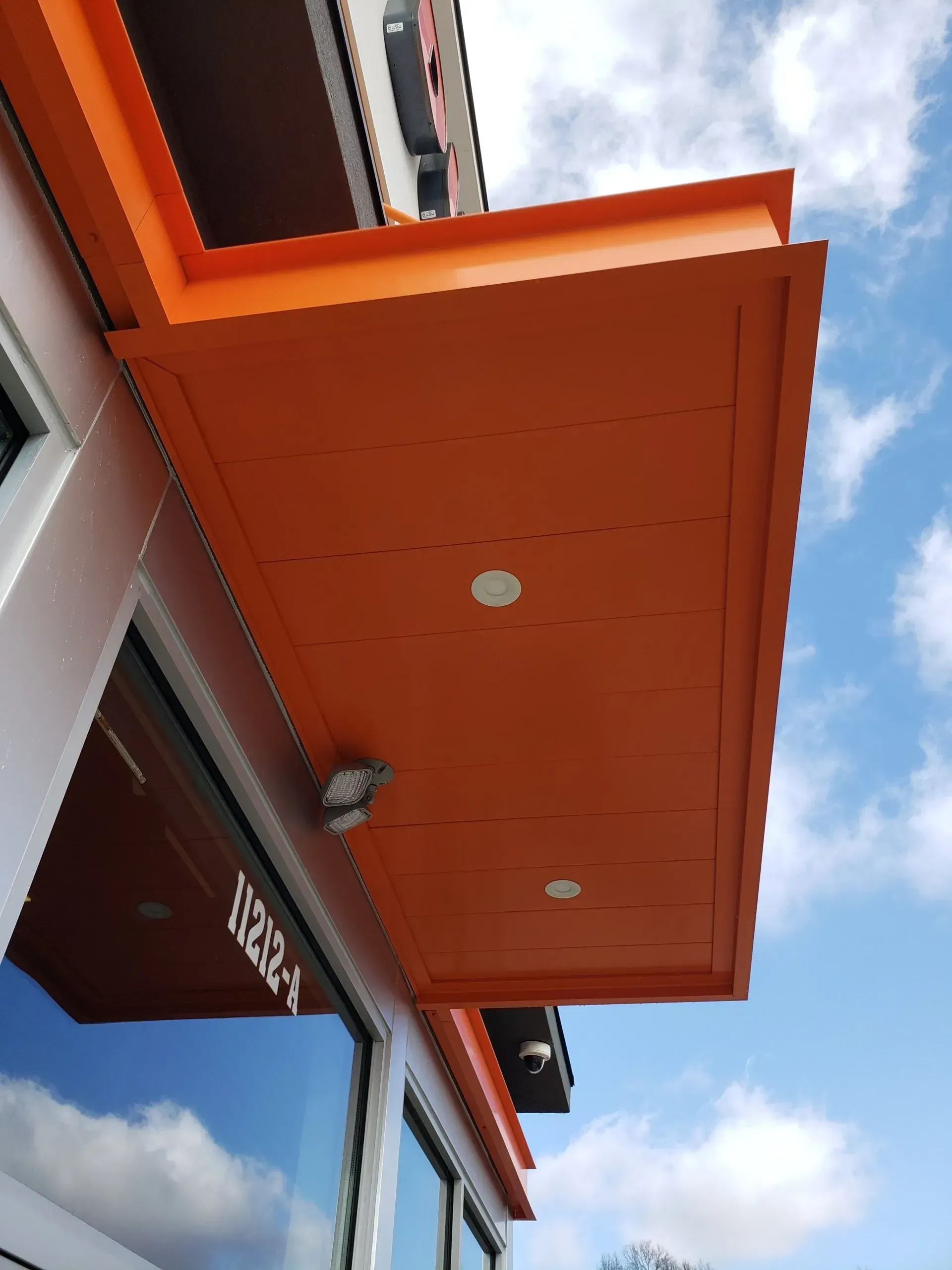 Dunkin Overhead Rod Canopy View Below — Decatur, AL — Evans Awnings