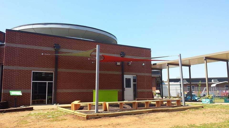 Awning Over the Benches in Front of the Building — Decatur, AL — Evans Awnings