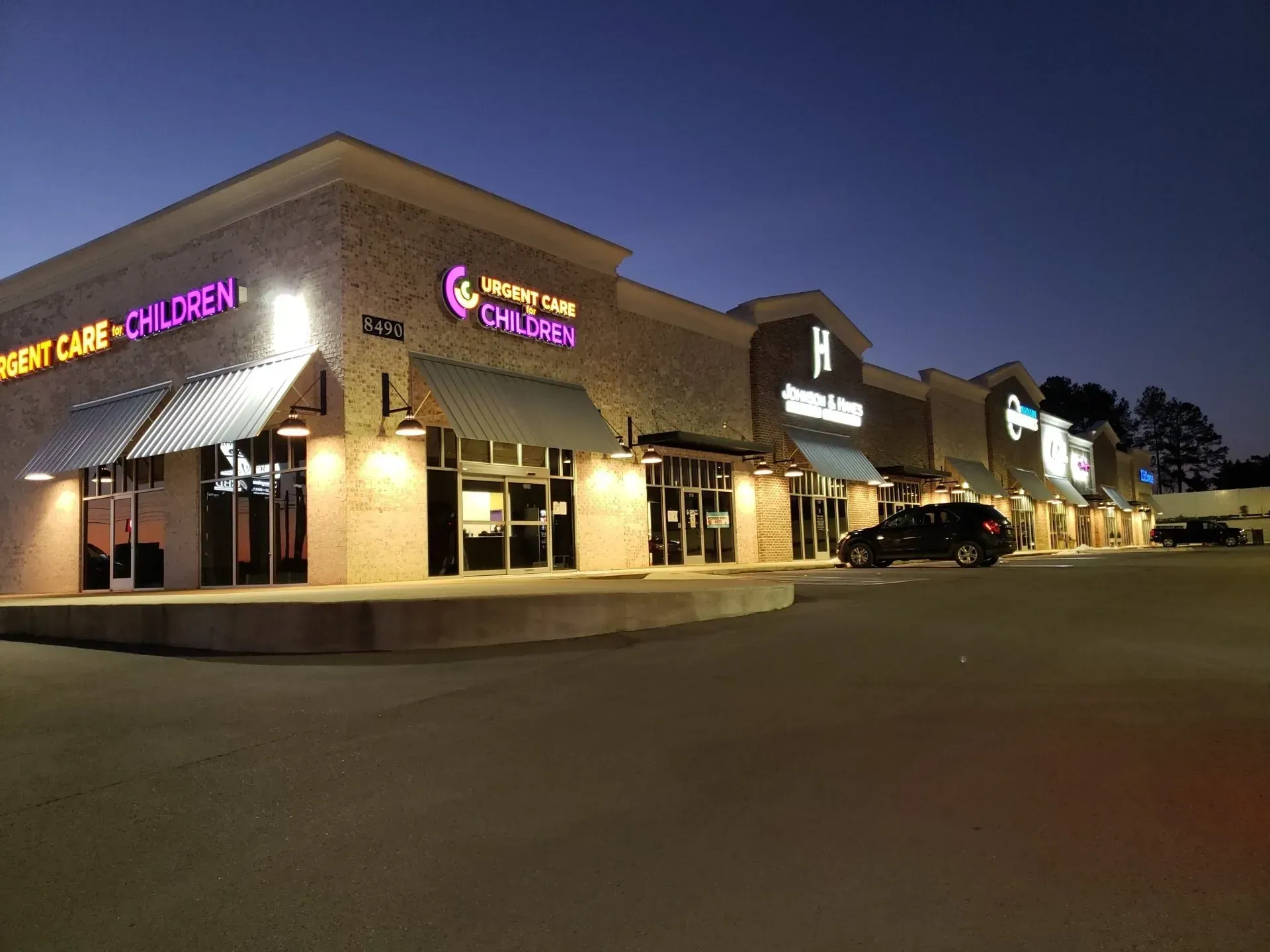 Commercial Building with Gray Standing Seam Awnings — Decatur, AL — Evans Awnings