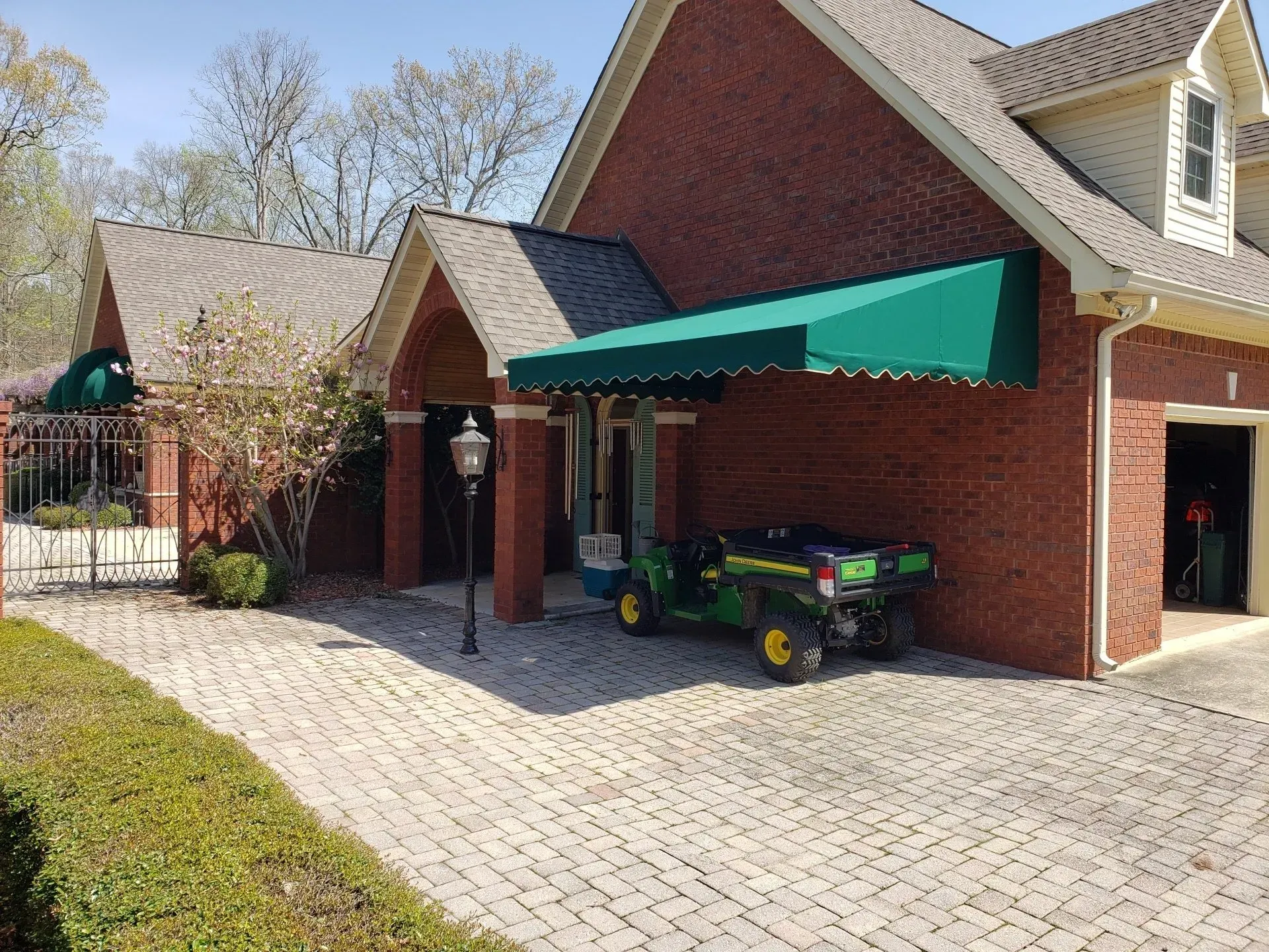 Brick Building with Green Slope — Decatur, AL — Evans Awnings