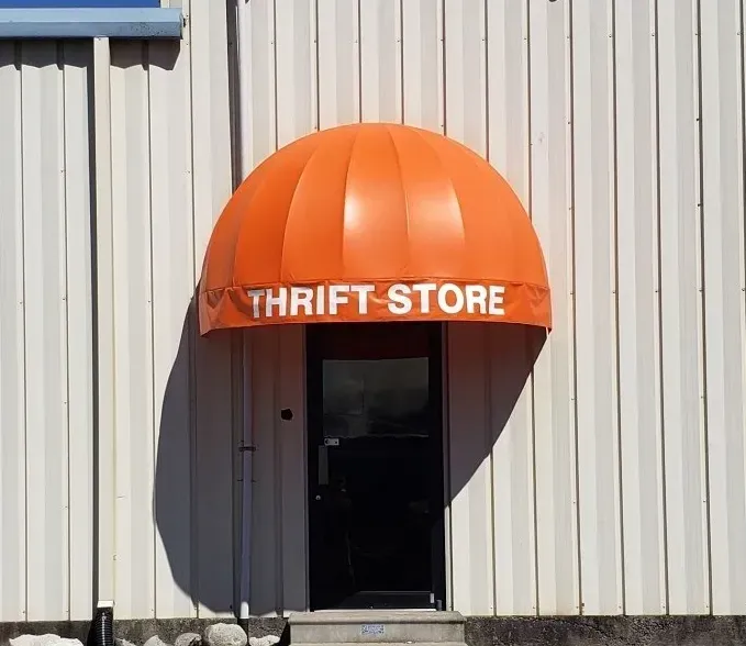 Orange Thrift Store Quarter Sphere Awning— Decatur, AL — Evans Awnings