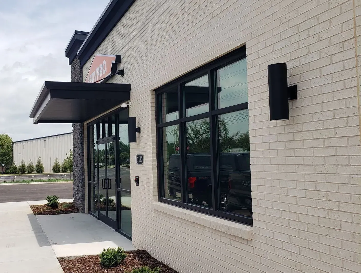 Servpro Overhead Rod Canopy — Decatur, AL — Evans Awnings