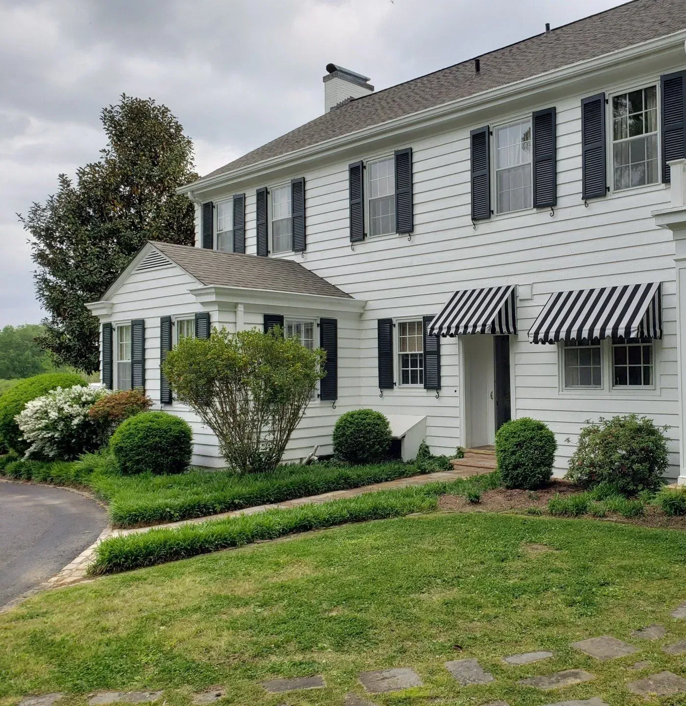 White House with Stripe Awnings — Decatur, AL — Evans Awnings