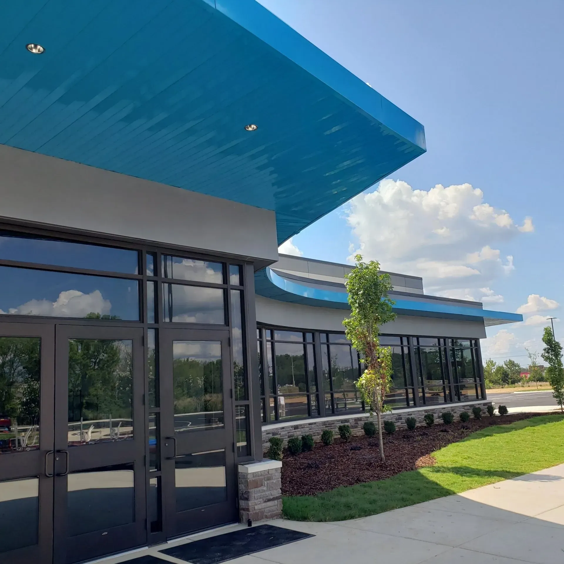 The Brook Church Blue Walkway Canopy — Decatur, AL — Evans Awnings