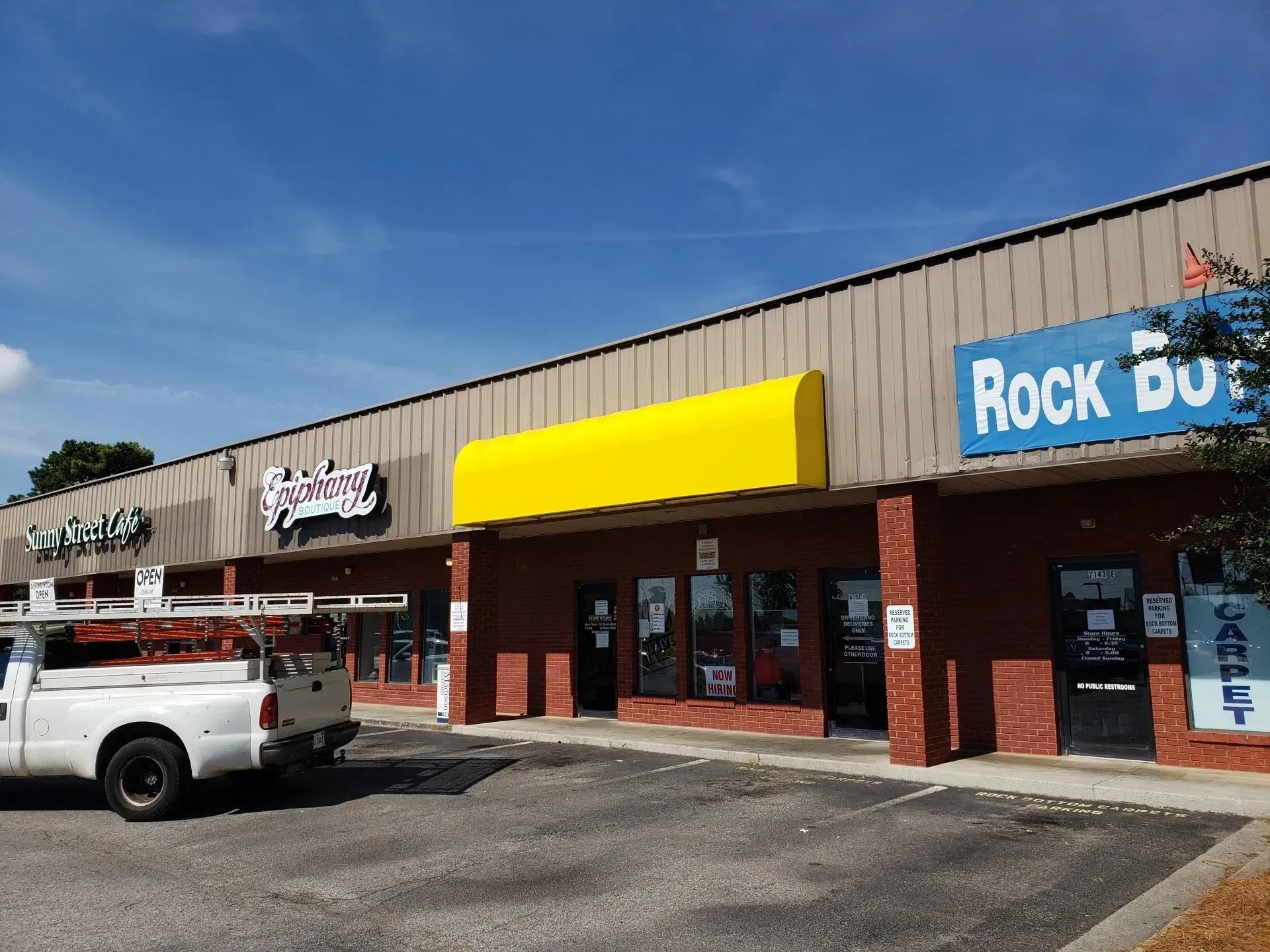 Commercial Building with Yellow Awning — Decatur, AL — Evans Awnings