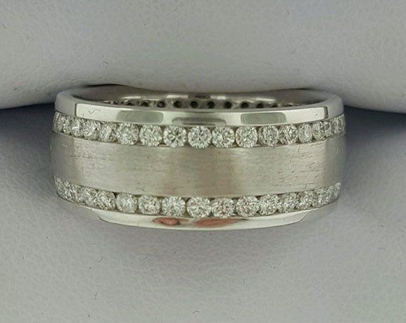wedding ring embedded with two rows of small diamonds