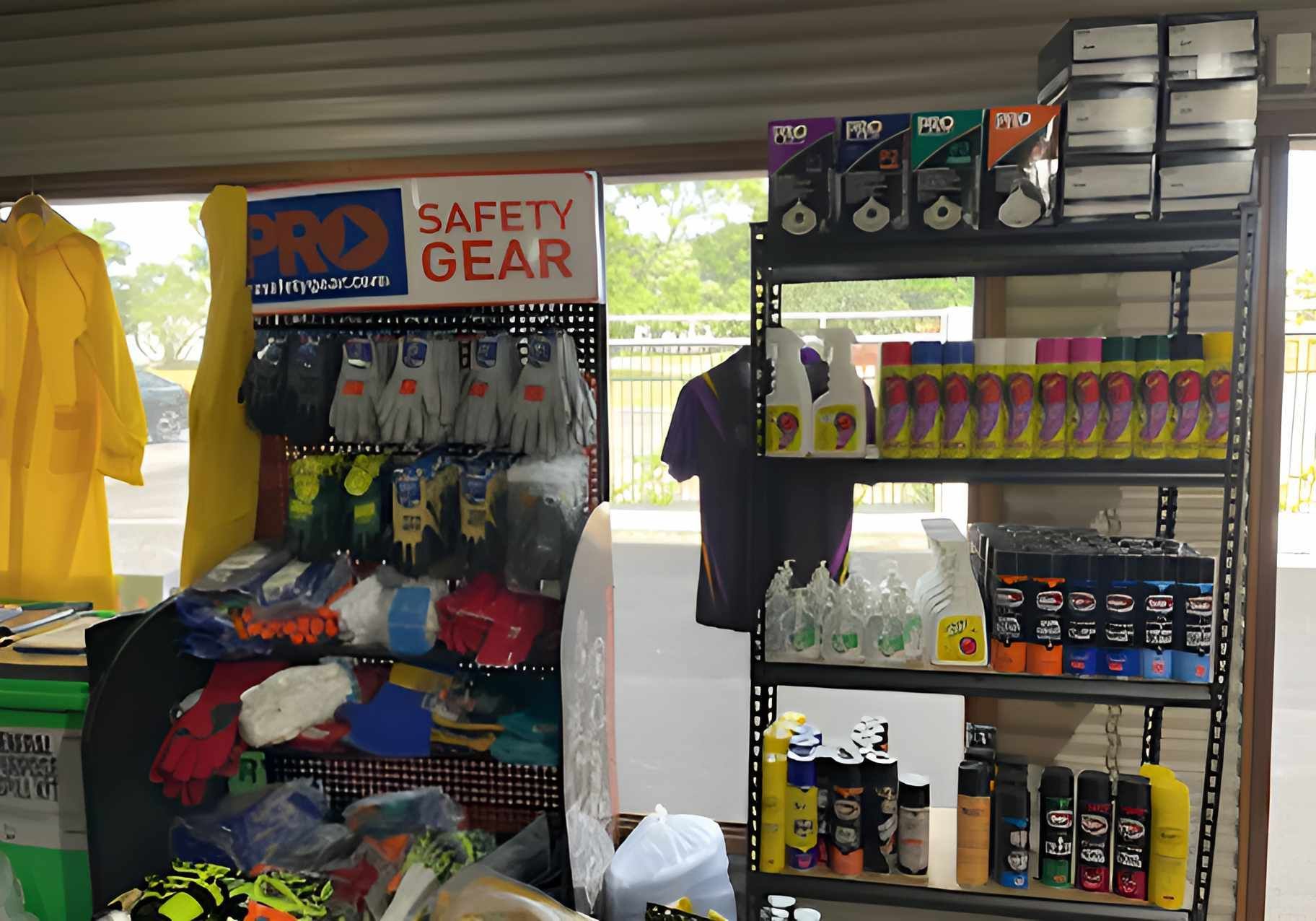 A Store Filled With Lots Of Safety Gear And Spray Bottles — Tableland Workwear In Tolga, QLD