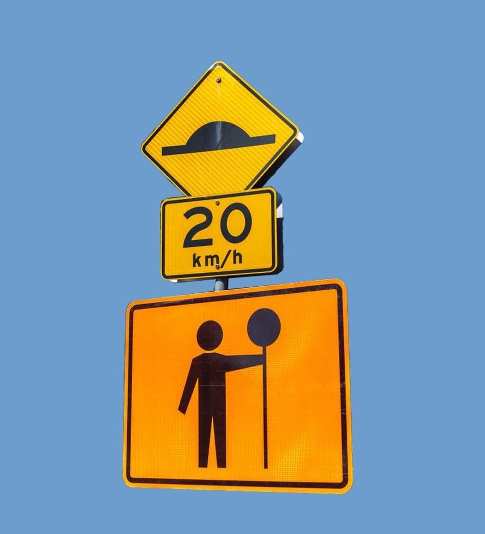 A Set Of Three Road Signs On A Blue Background — Tableland Workwear In Tolga, QLD