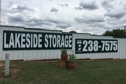 Storage - Long rows of closed storage bays with white doors in Fort Worth, TX Storage - Long rows of closed storage bays with white doors in Fort Worth, TX