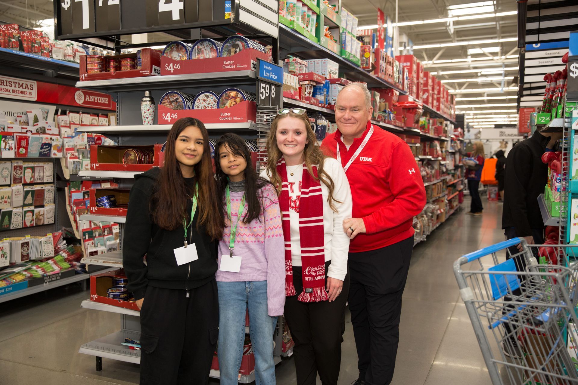 A group of people are posing for a picture in a store.