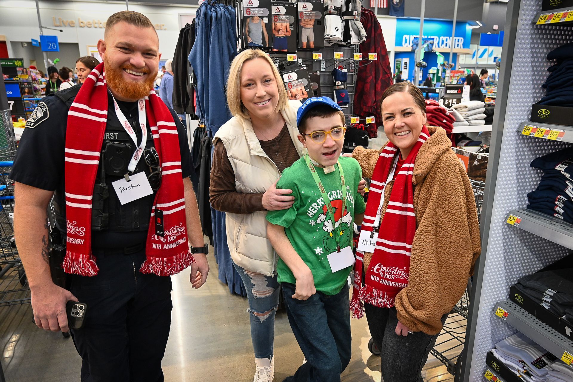 A group of people are posing for a picture in a store.