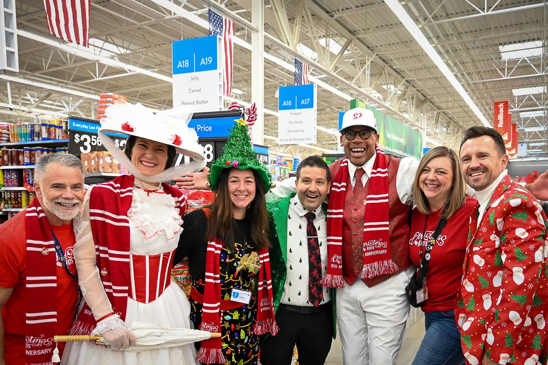 A group of people are posing for a picture in a store.
