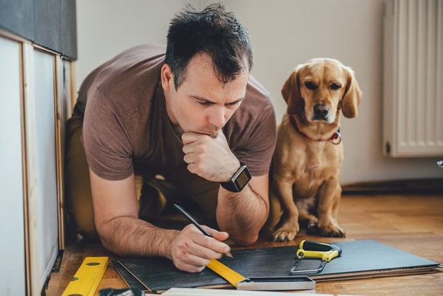 How does a renovation work picture man with dog Suds Renovation
