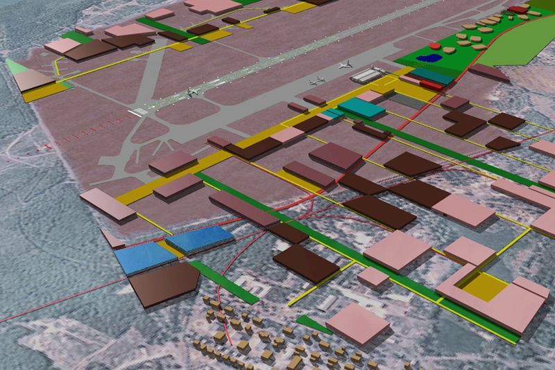 Eine Luftaufnahme einer Stadt mit vielen Gebäuden und Straßen.