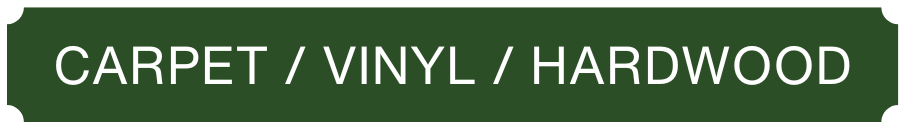 A green sign that says carpet / vinyl / hardwood