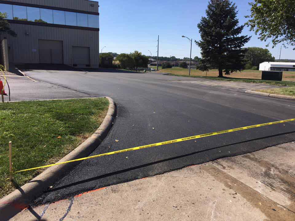 Driveway Installation— Photo of Asphalted Road in Omaha, NE