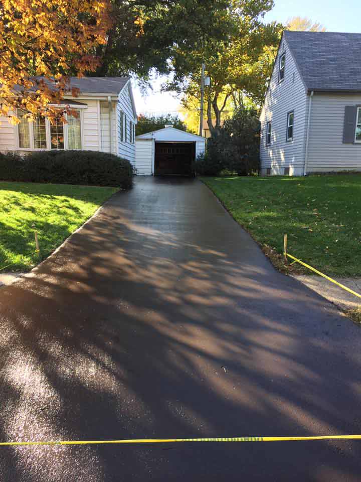 Driveway Asphalt — Newly Asphalted Driveway in Omaha, NE