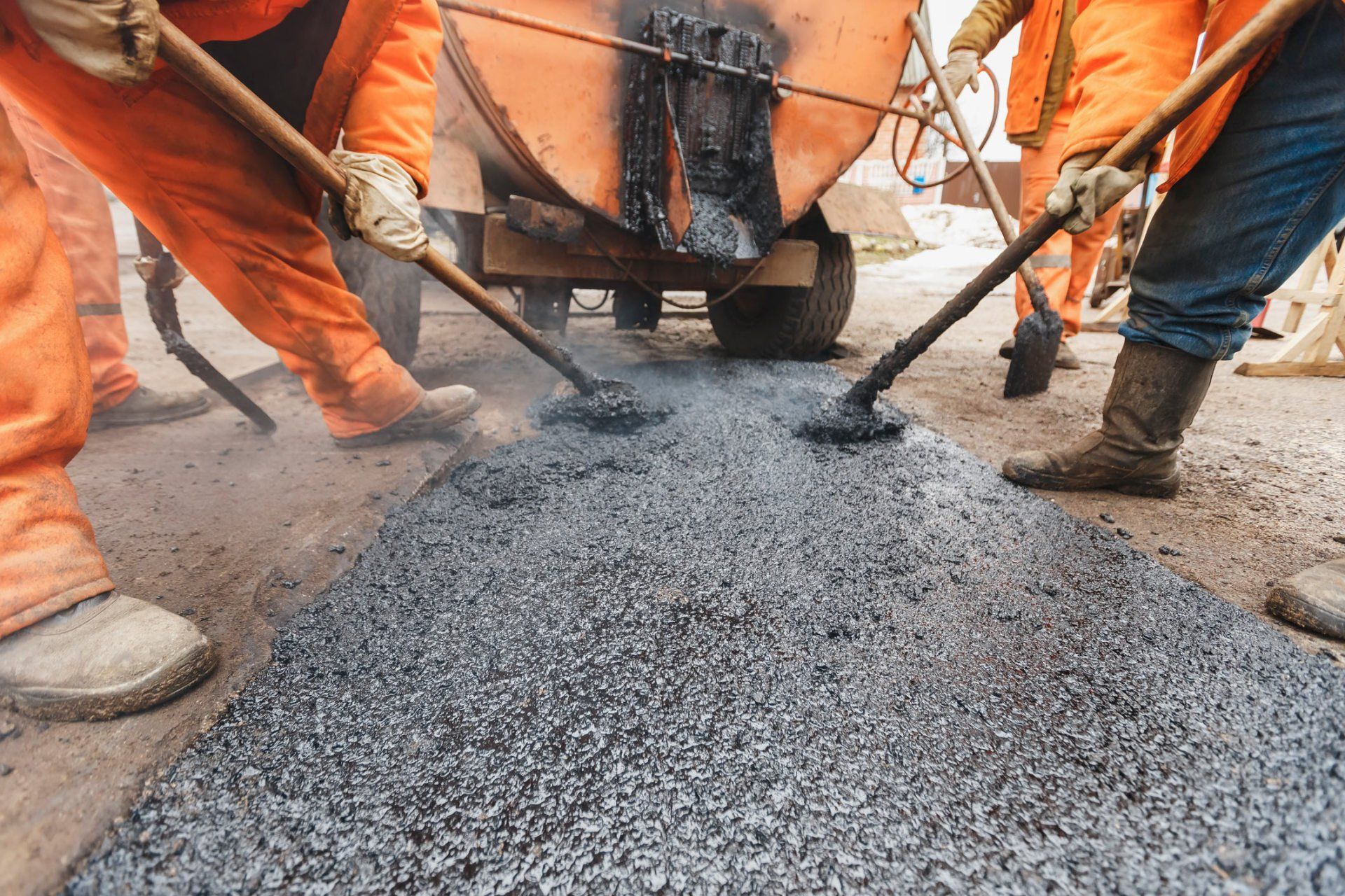 Paving Contractors — Fixing a Road in Omaha, NE