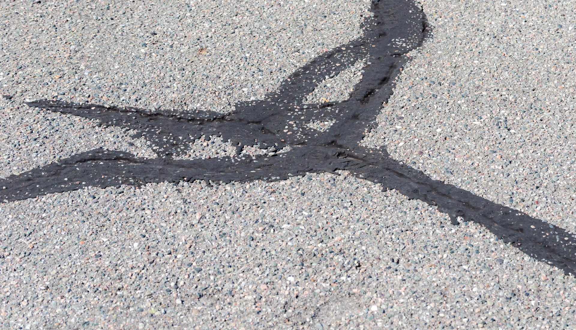 Crack Filling — Road with Crack Filling Asphalt in Omaha, NE