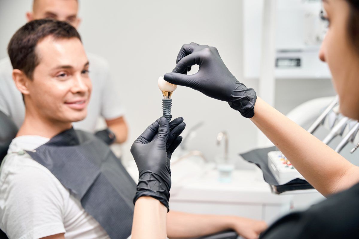 Same day dental implant model demonstration during consultation appointment