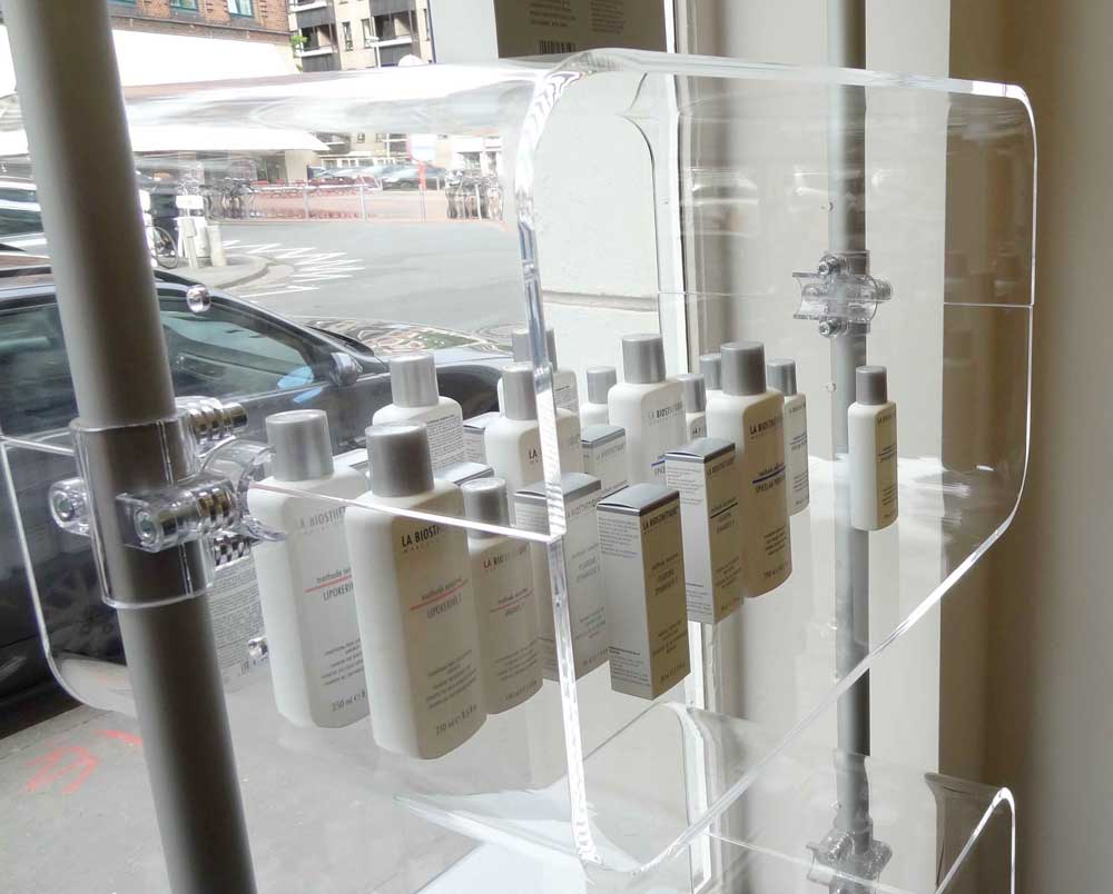 scaffale a mensole trasparenti componibile per vetrina