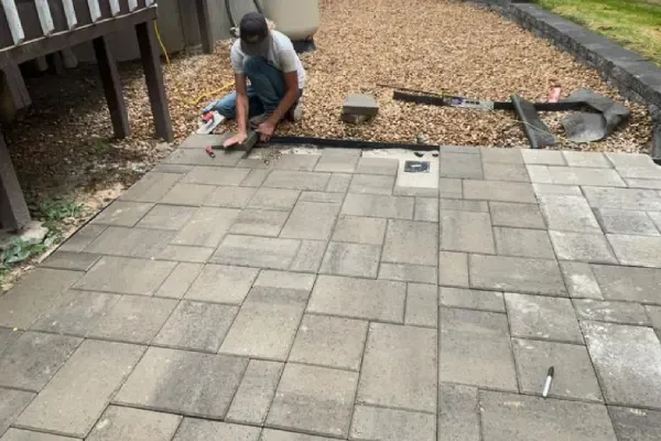 Professional hardscaping services including stonework, retaining walls, and paver installation