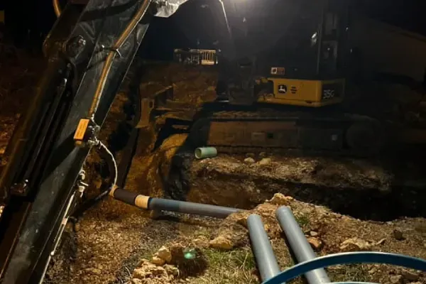 Yard drainage installation to prevent water pooling and soil erosion