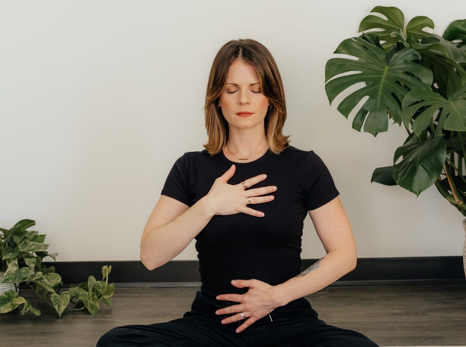 Jennifer Lancaster practicing somatic breathwork in trauma-informed yoga for eating disorders