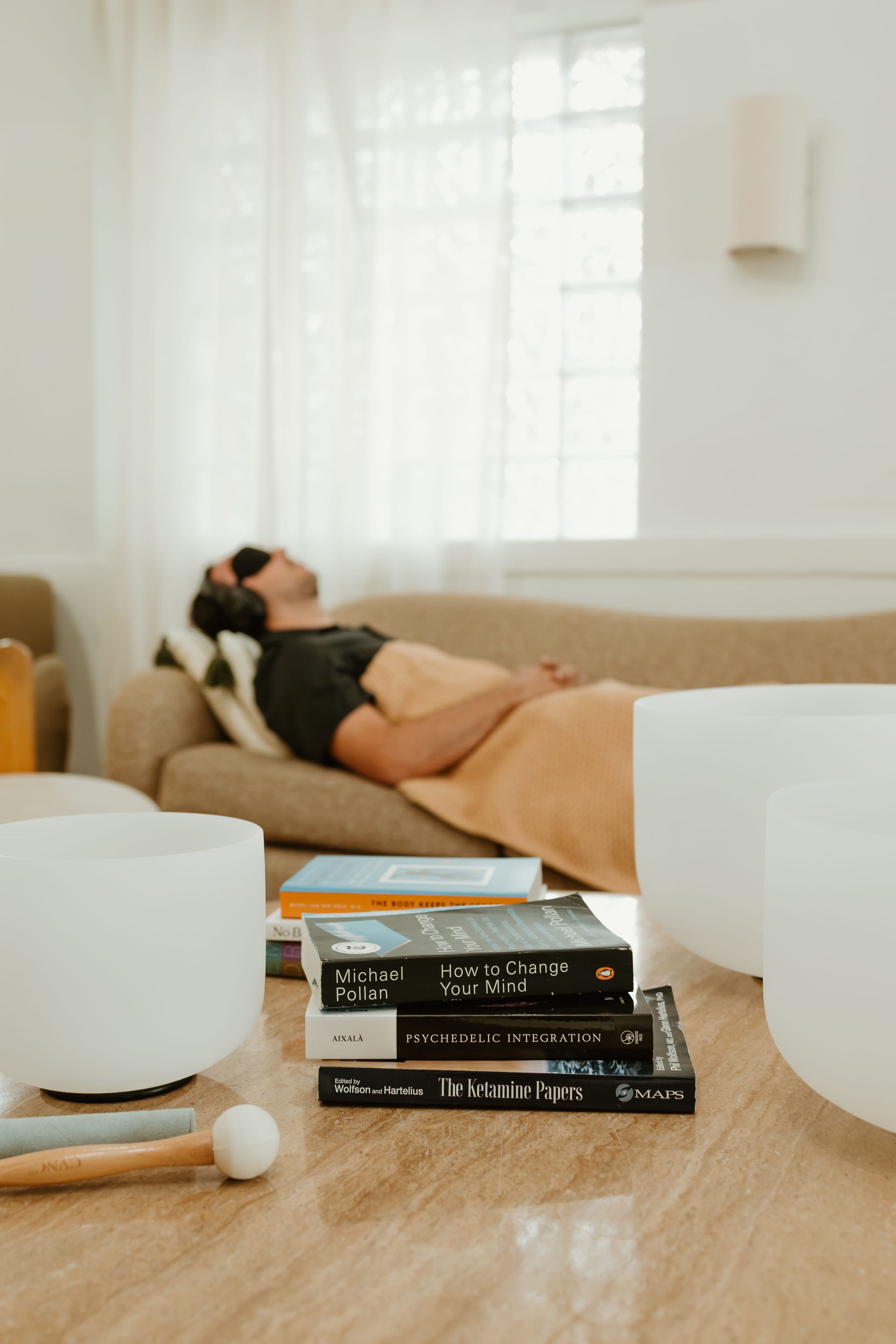 A man laying on a couch.