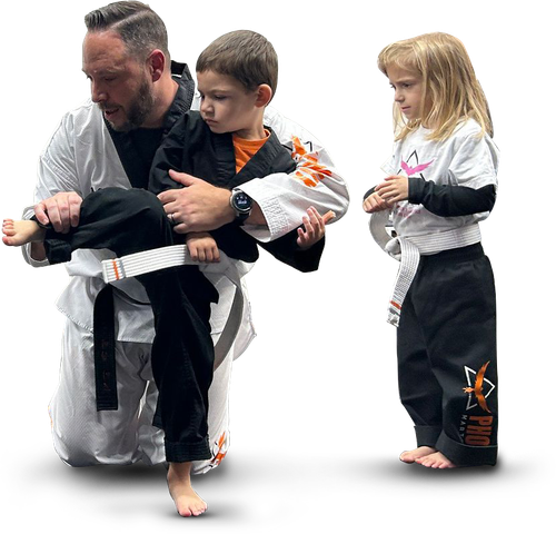 Instructor helping children build confidence through kids martial arts at Phoenix Martial Arts in Murfreesboro