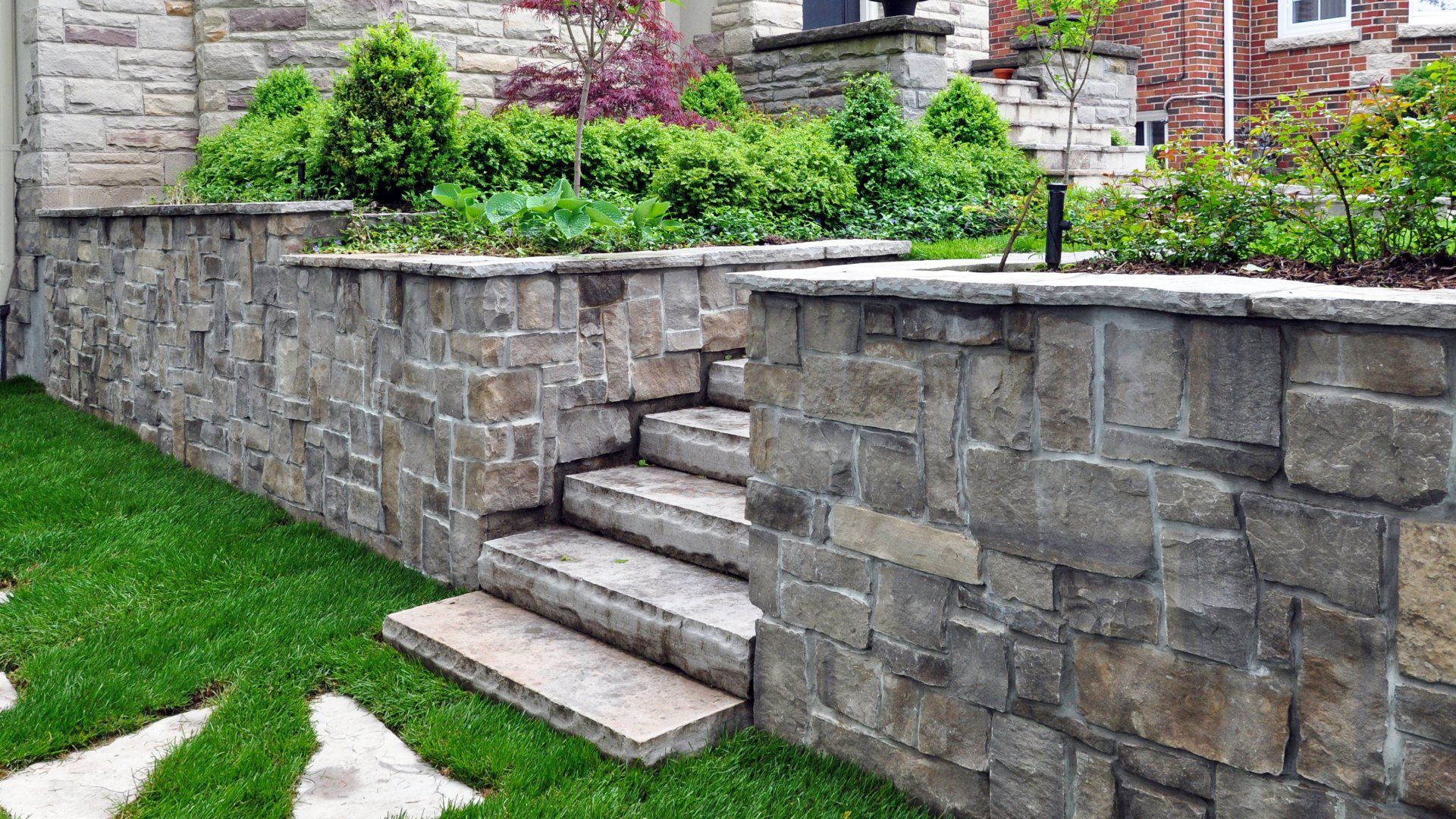 Natural stone steps and retaining wall in the garden