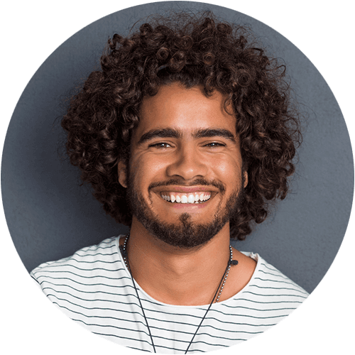 man with afro smiling