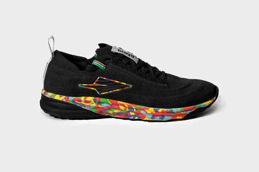 a pair of black running shoes with a colorful sole