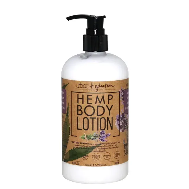 a bottle of hemp body lotion with a pump on a white background .