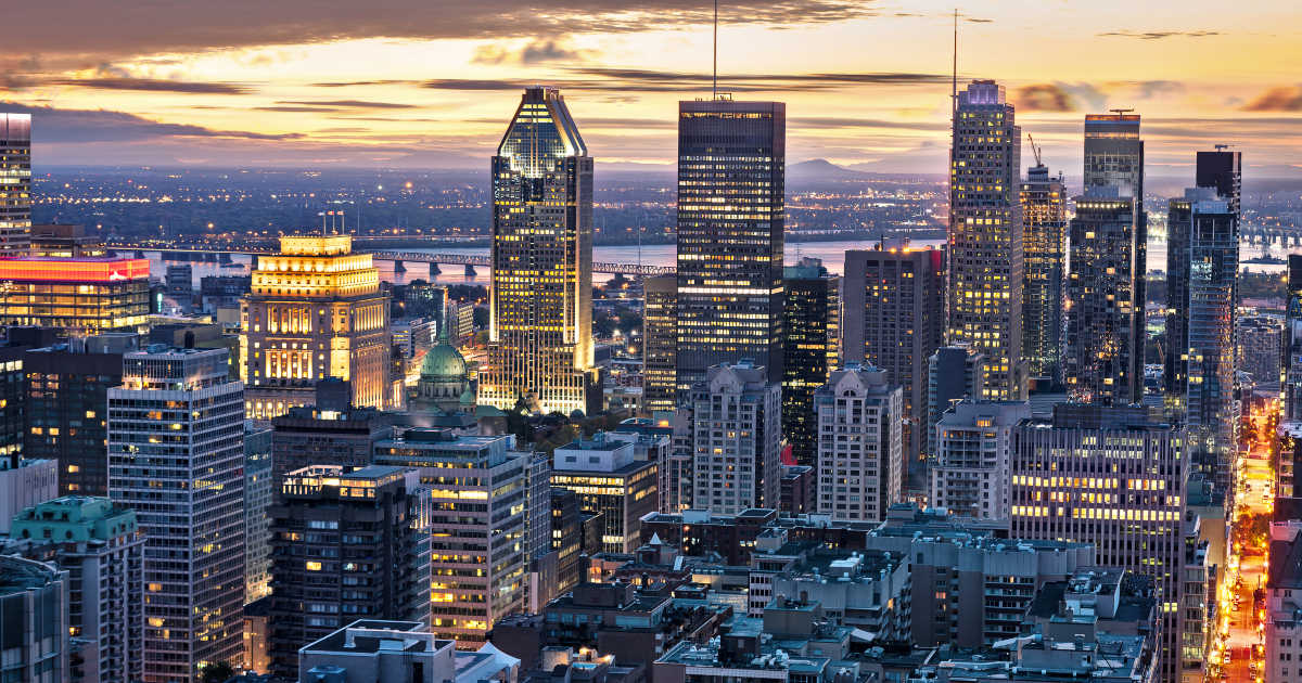 An aerial view of a city skyline at night.