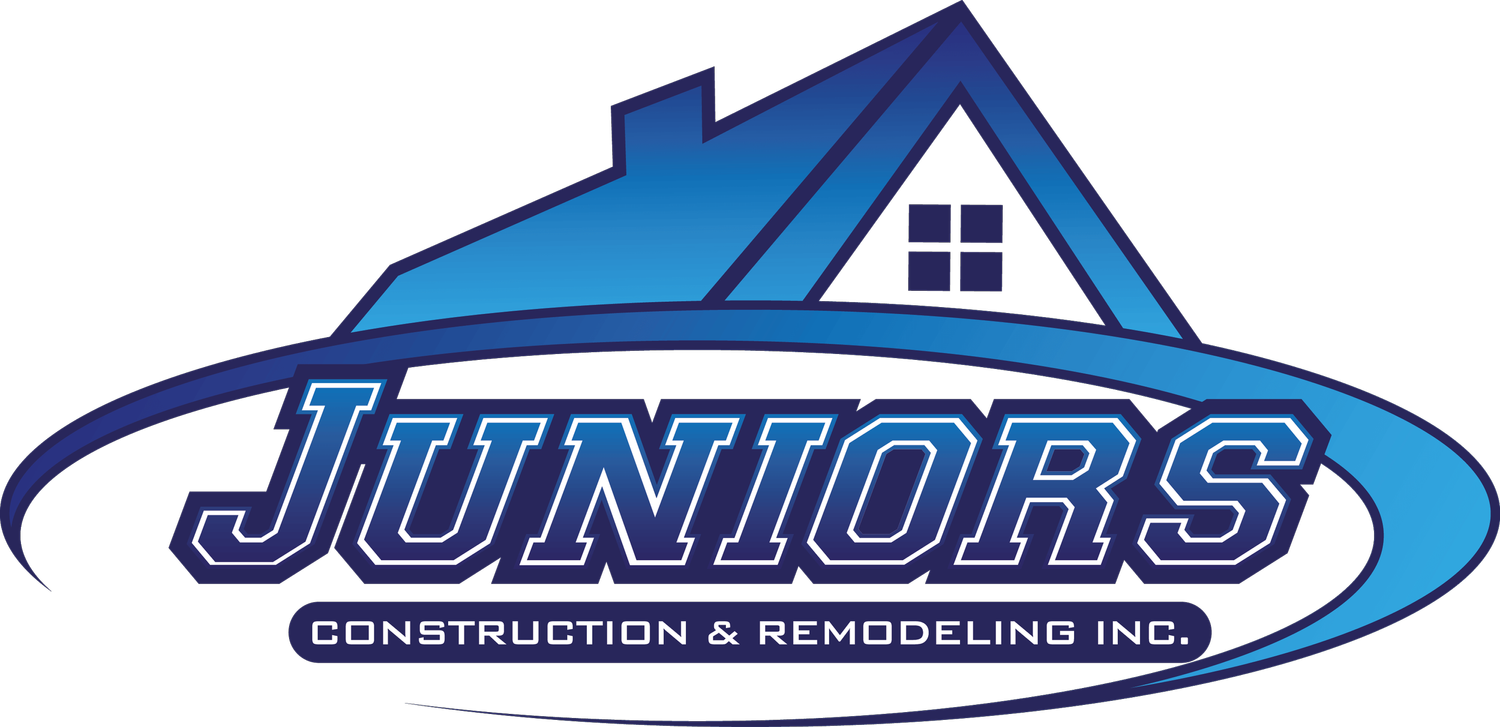 Logo for Juniors Construction & Remodeling Inc. with a blue house and text.