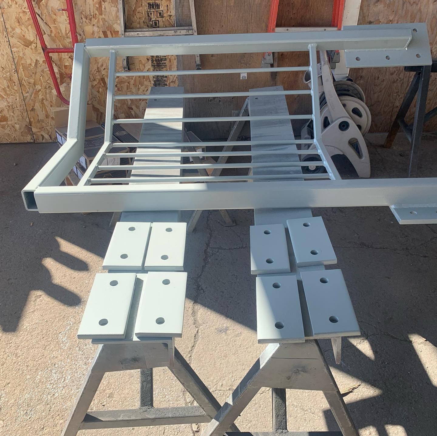 A piece of metal sitting on top of a wooden table