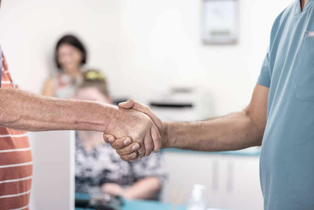 Happy customer at the Baji Denture Clinic