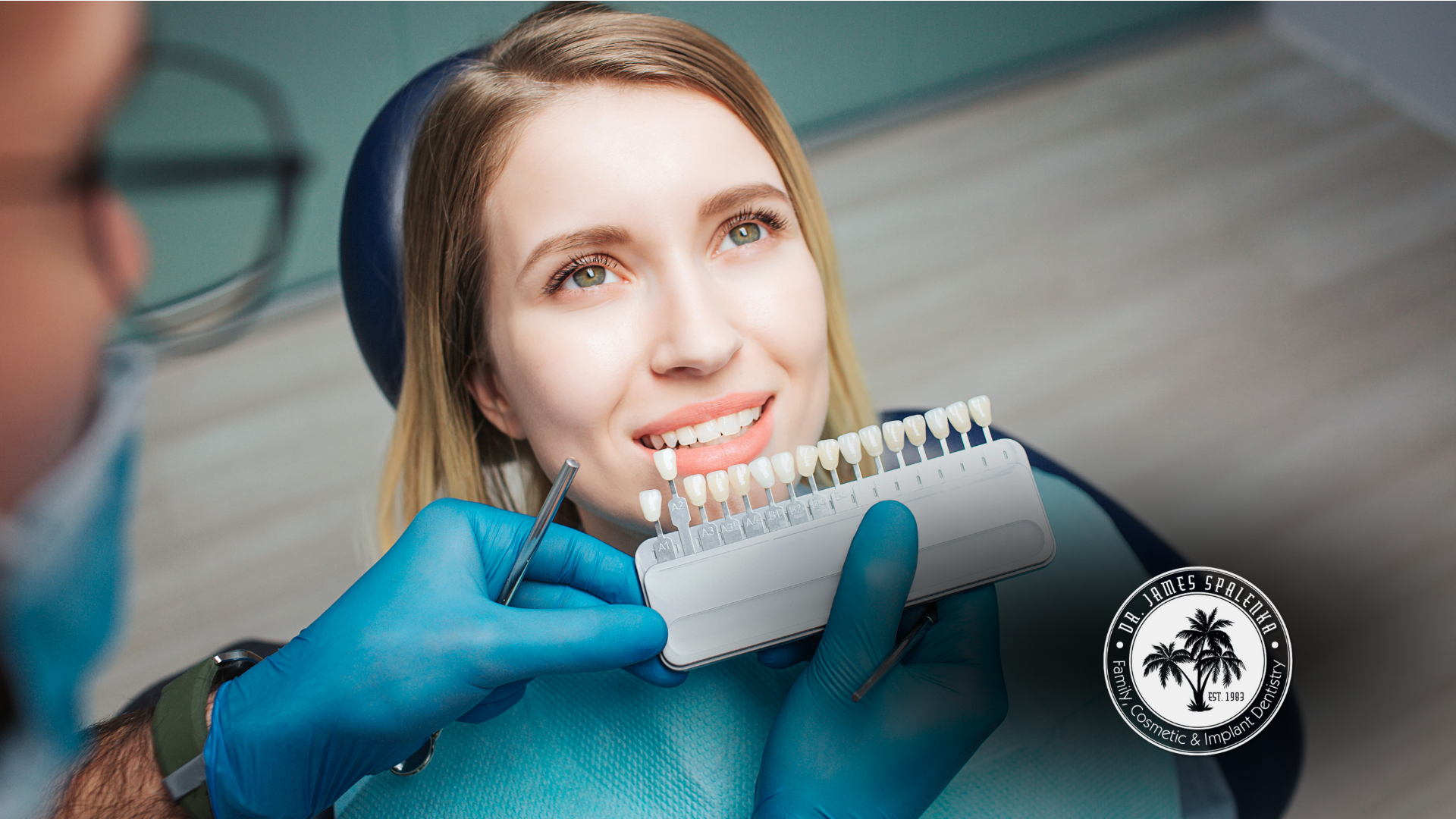 A woman is getting her teeth examined by a dentist.