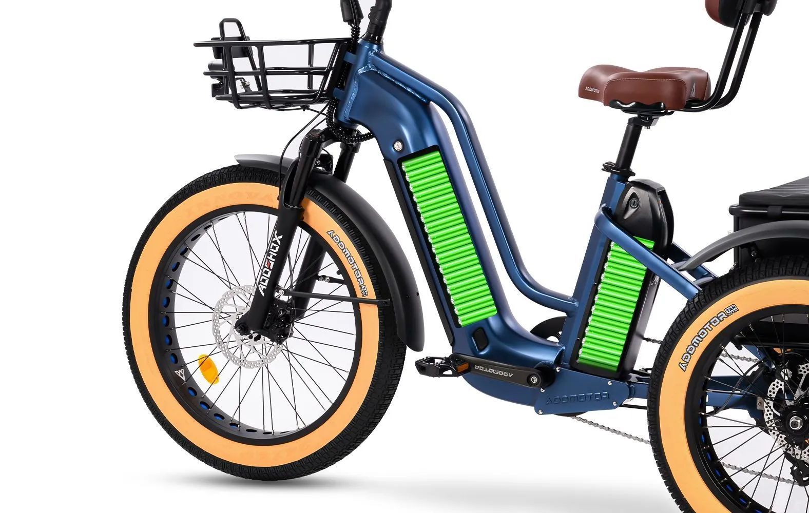 Blue electric cargo bike with tan tires and green battery panels on a white background