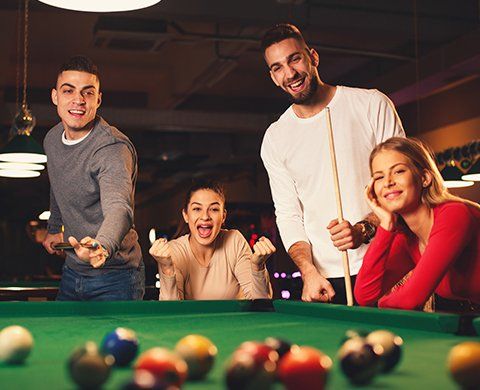 Playing Pool Table at Night Out — Waite Park, MN — Total Recreation