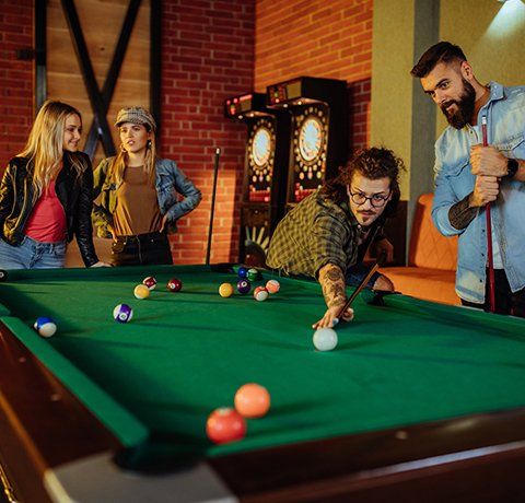 Group of Friends Playing Pool Table — Waite Park, MN — Total Recreation