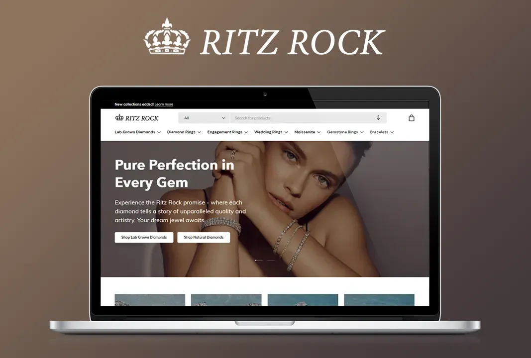 A ritz rock website is displayed on a laptop