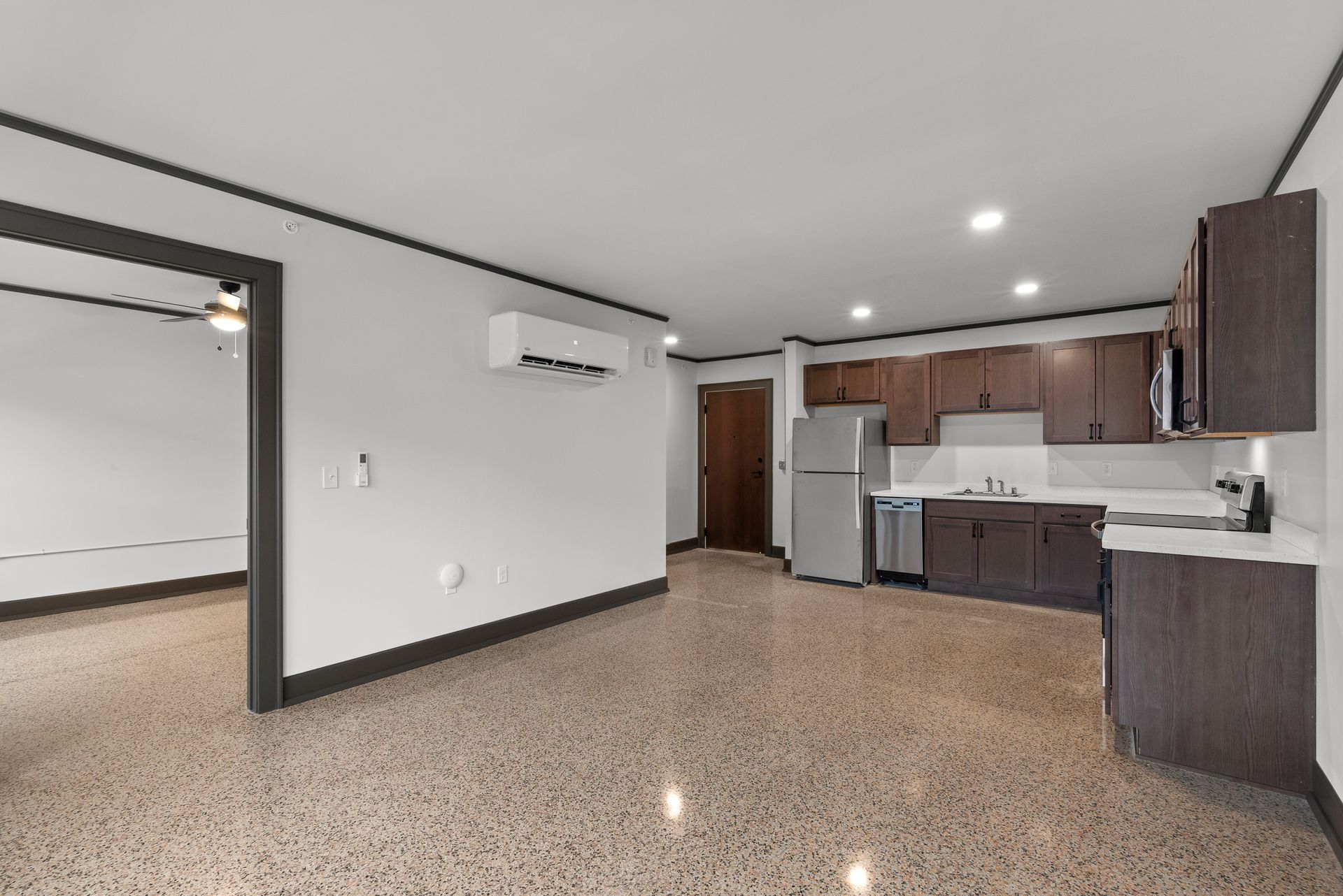 Photo showing the kitchen in the background