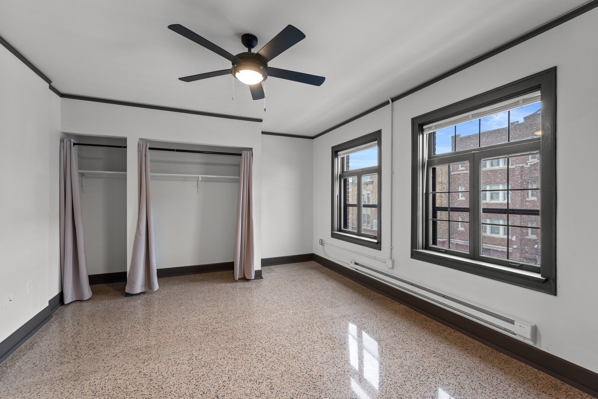 Photo showing a bedroom with plenty of natural light